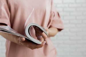 woman reading a magazine